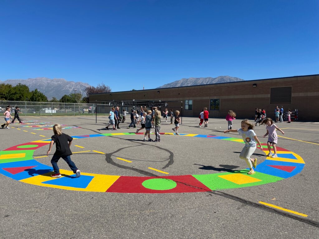 Image_ children playing tag on a new painting playground game