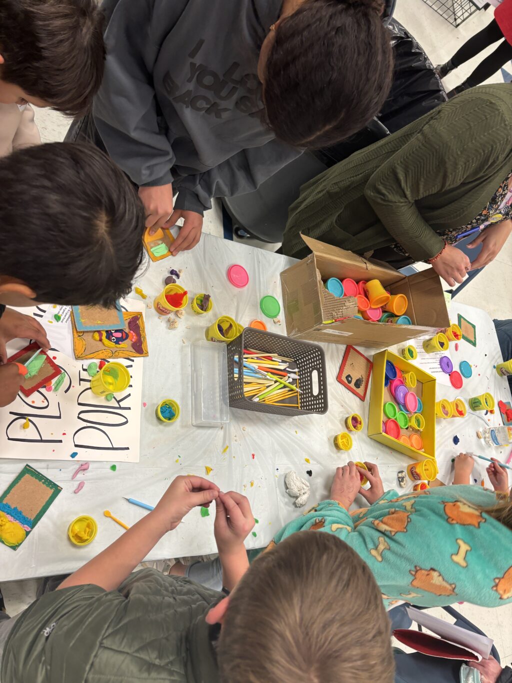 people participating in various art creation activities