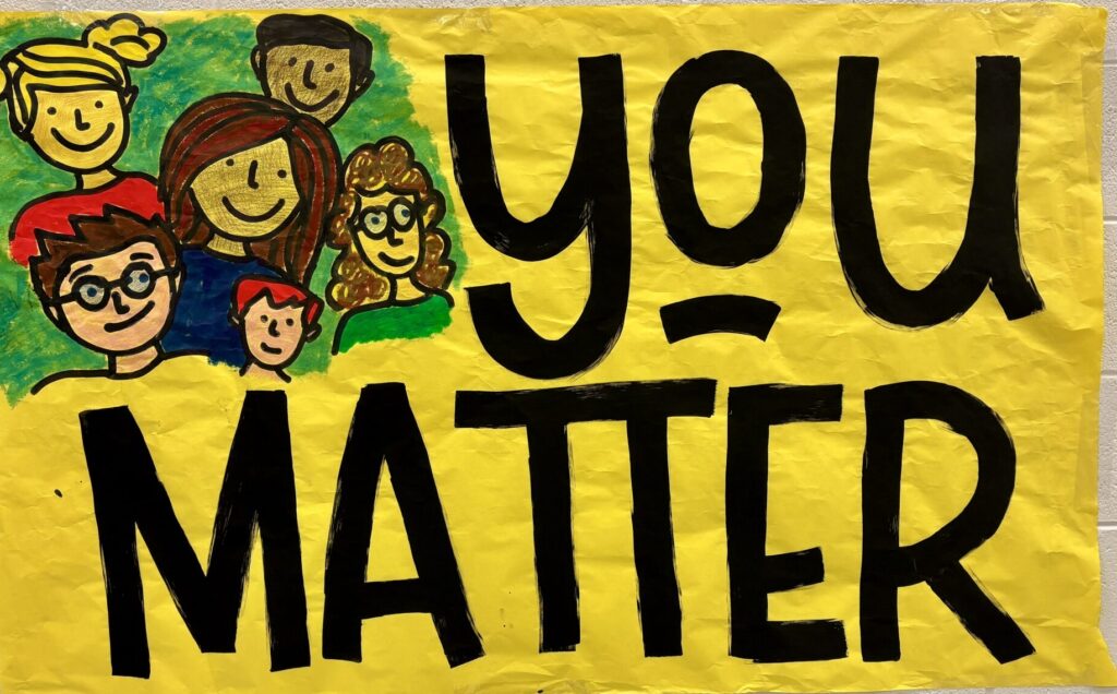 a poster that states You Matter which was the theme of the art show