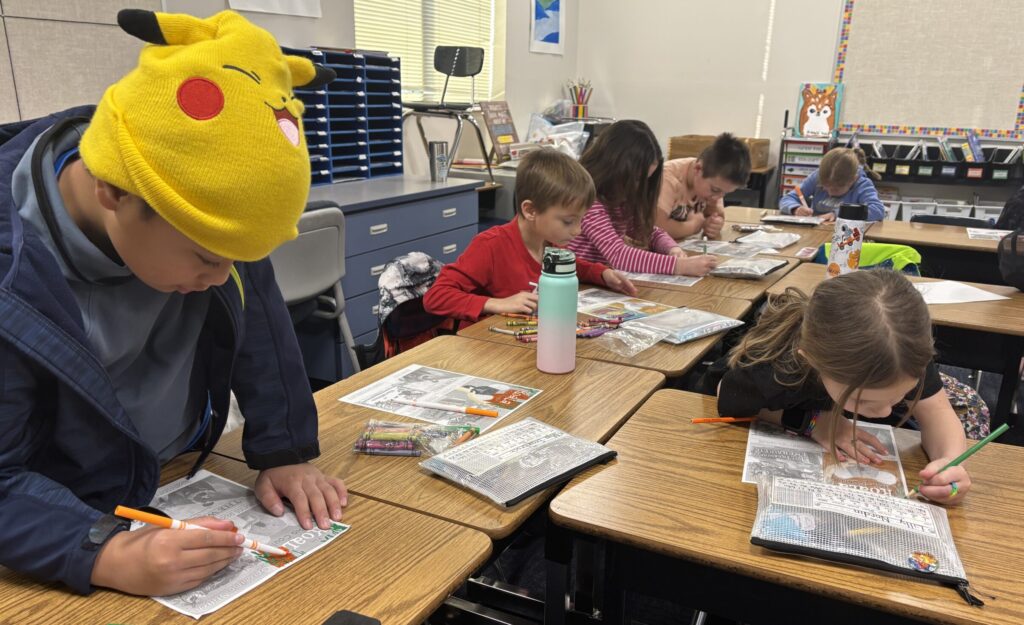 students involved in a reading challenge. Finding answers to answer questions about books they have read together.