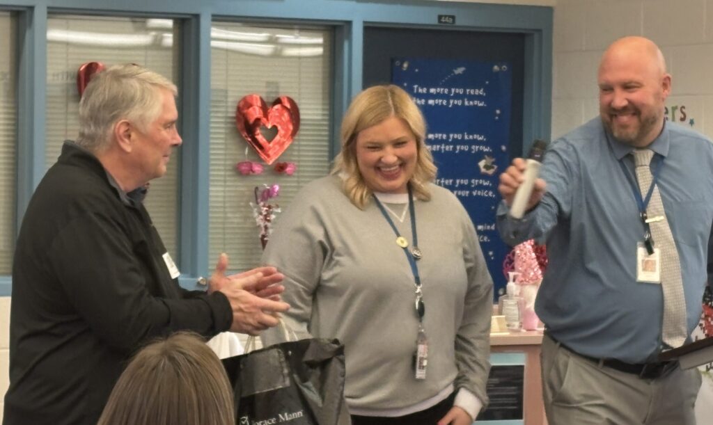 Horace Mann, Kylee Perryman and Principal McCarty for the Crystal Apple Awarding