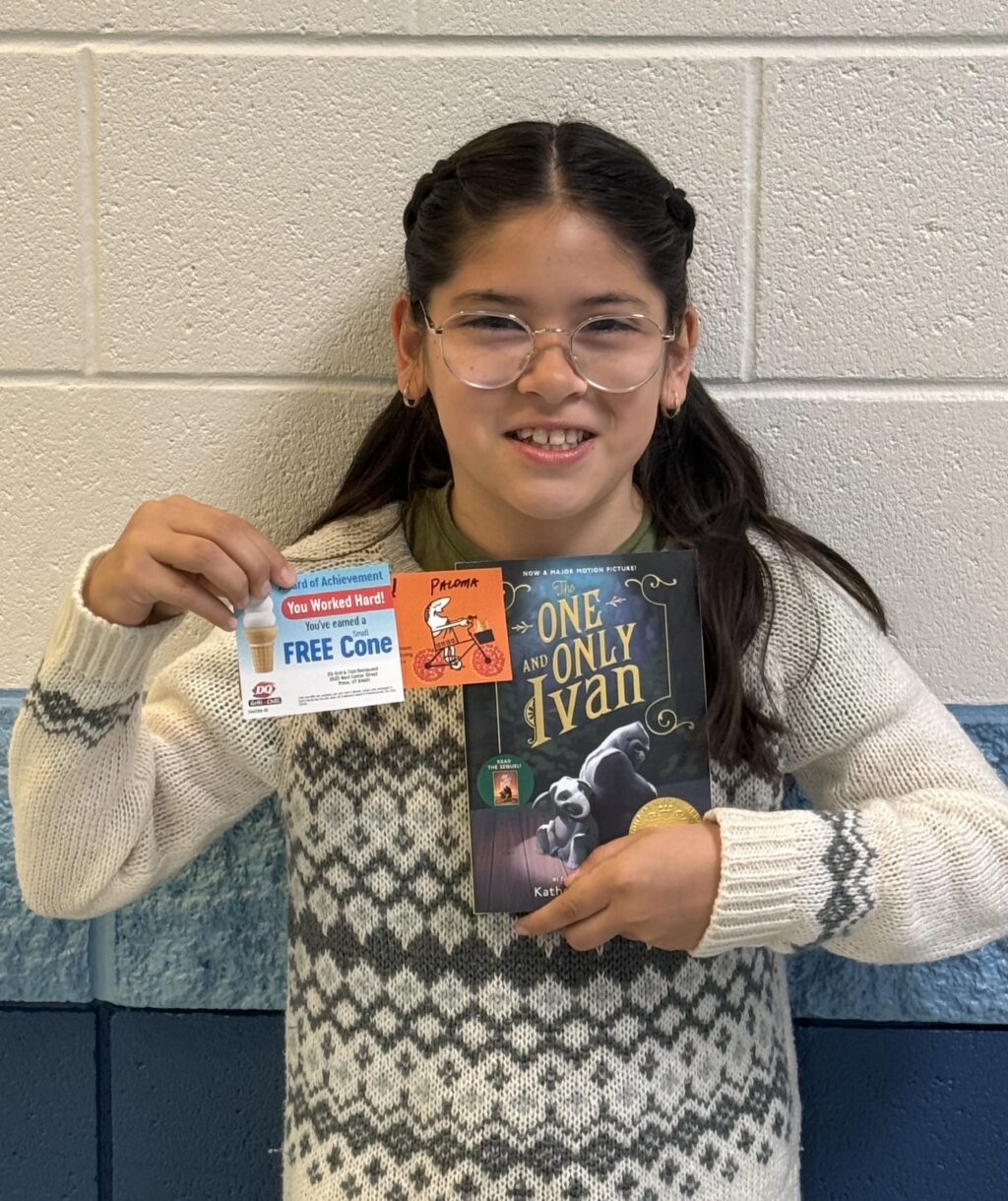 Student receiving a AVIATOR or RISE Praise award