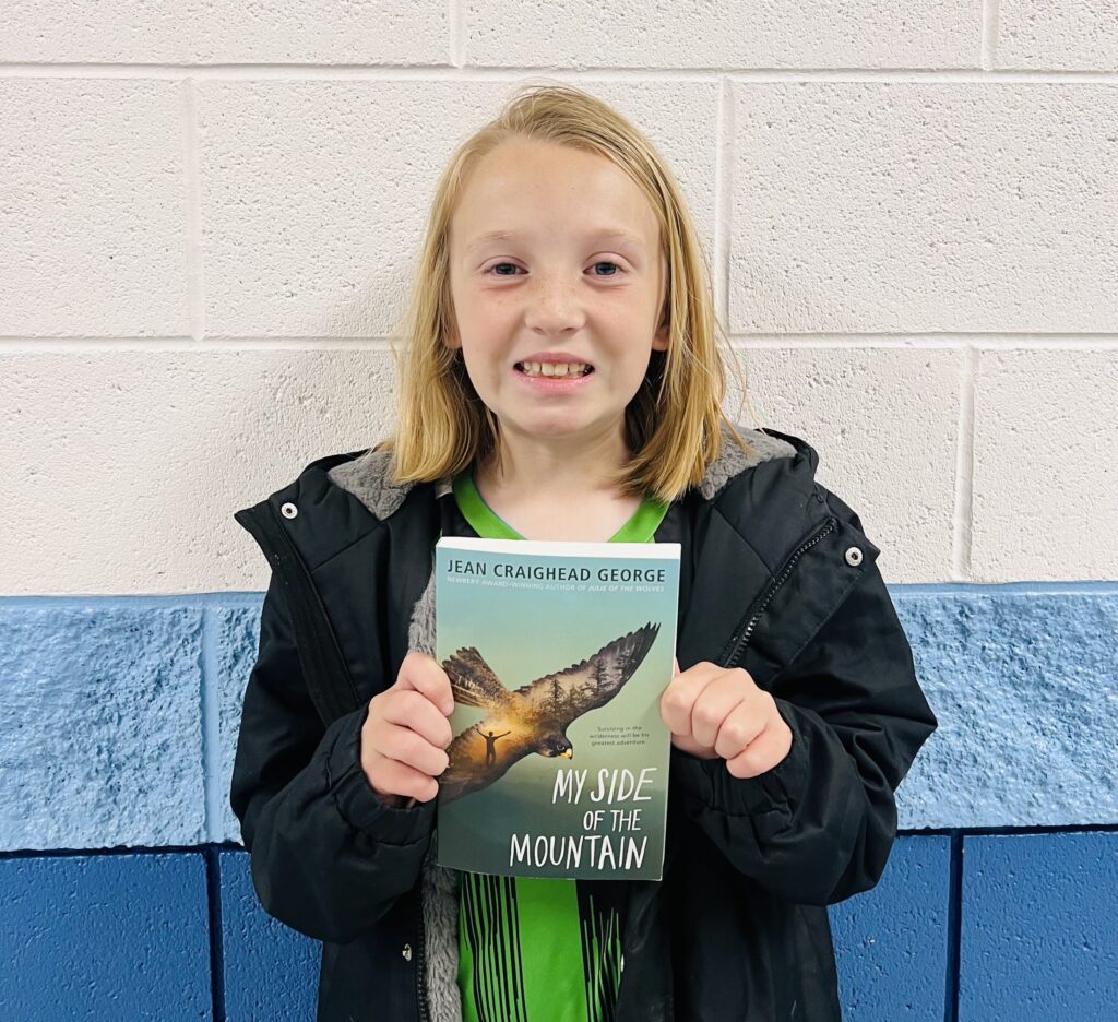 Student receiving a AVIATOR or RISE Praise award
