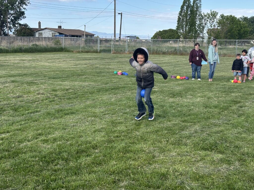 Field Day May 2025 Students engaged in various outdoor games.
