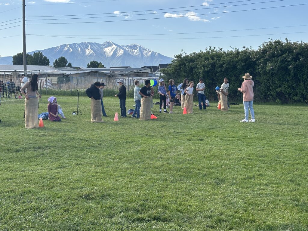 Field Day May 2025 Students engaged in various outdoor games.