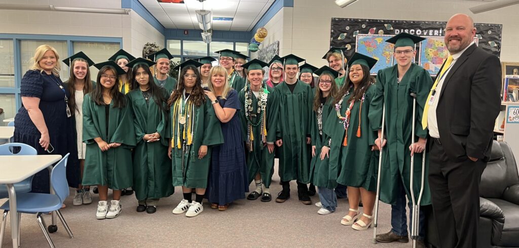 Provo High graduates and former students of Amelia Earhart with Mr. McCarty, Mrs. Perry, and Mrs. Roberts